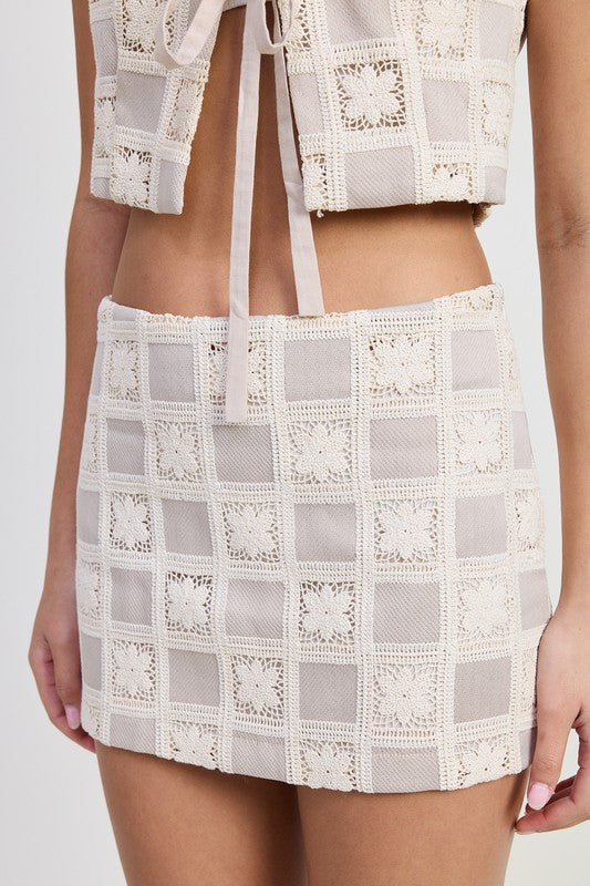 Emory Park Mini Jacquard Skirt in beige with textured square pattern and crochet details