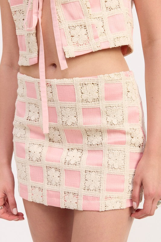 Emory Park Mini Jacquard Skirt in pink and cream with crochet square pattern and fitted silhouette