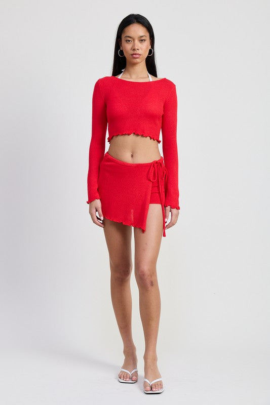 Emory Park red long sleeve boat neck cropped top paired with matching skirt and white sandals