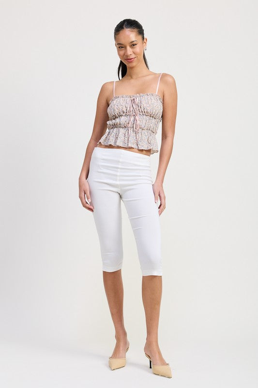 Emory Park Floral Tiered Ruffle Top with spaghetti straps worn with white cropped pants