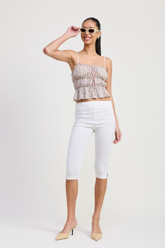 Emory Park Floral Tiered Ruffle Top in soft colors worn with white cropped pants and beige heels