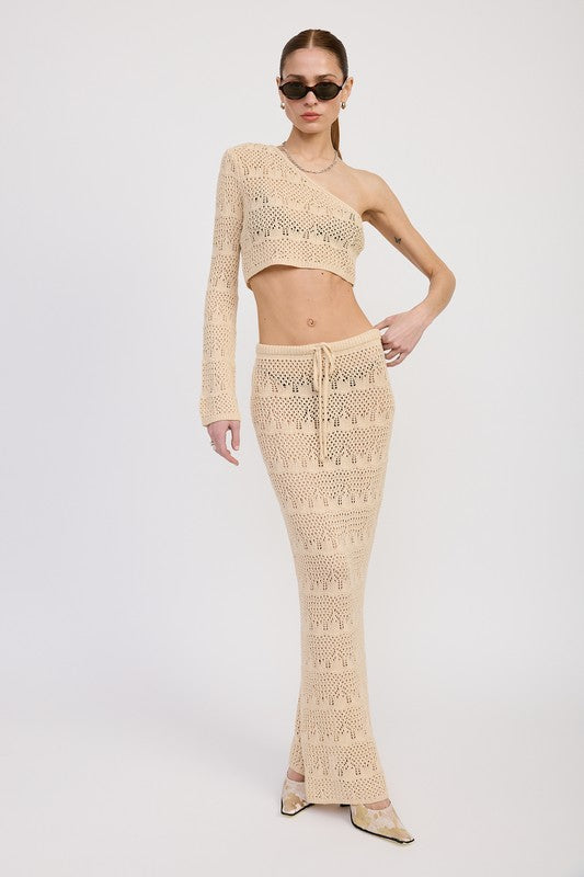 Emory Park beige One Shoulder Crochet Crop Top paired with matching crochet skirt and sunglasses