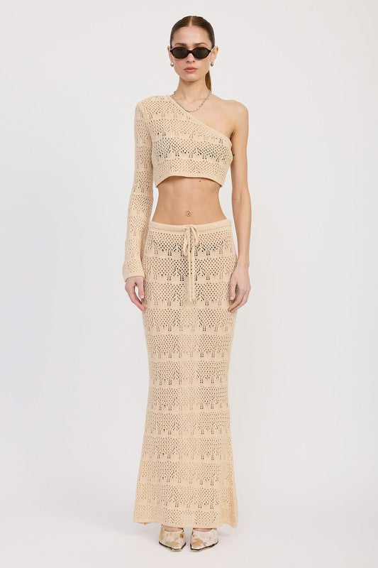 Emory Park beige one shoulder crochet crop top paired with matching long crochet skirt
