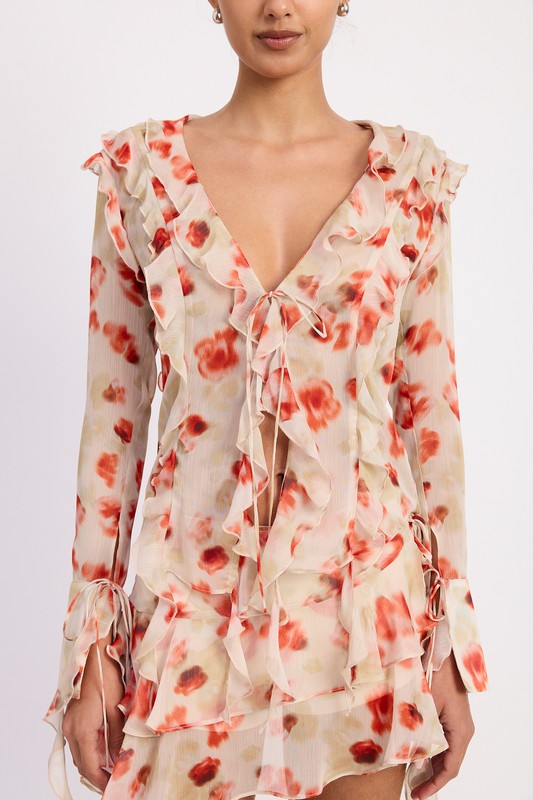 Emory Park Ruffle Trim Sheer Peplum Top with floral print and tie details on front and sleeves