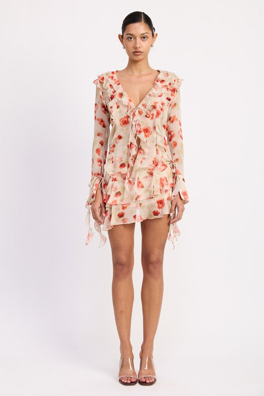Emory Park Ruffle Trim Sheer Peplum Top with floral pattern and long sleeves on model