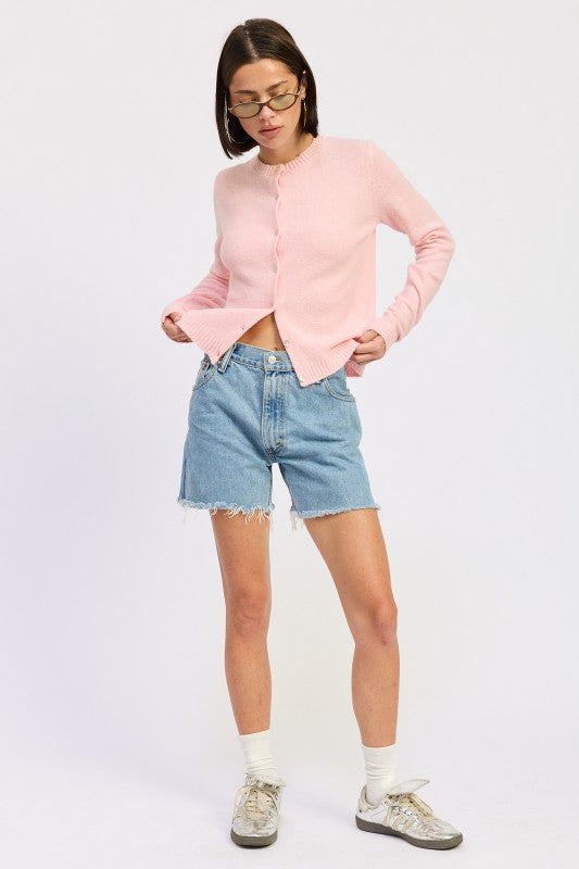 Emory Park Fitted Button-Up Cardigan in Light Pink, styled with denim shorts for a casual look