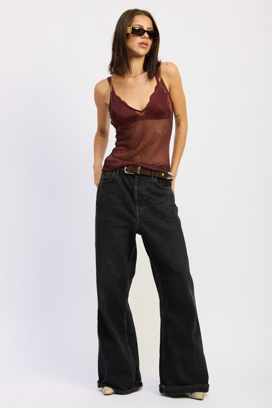 Emory Park Metallic Chainmail Bias Cami Top in burgundy paired with high-waisted black wide-leg jeans