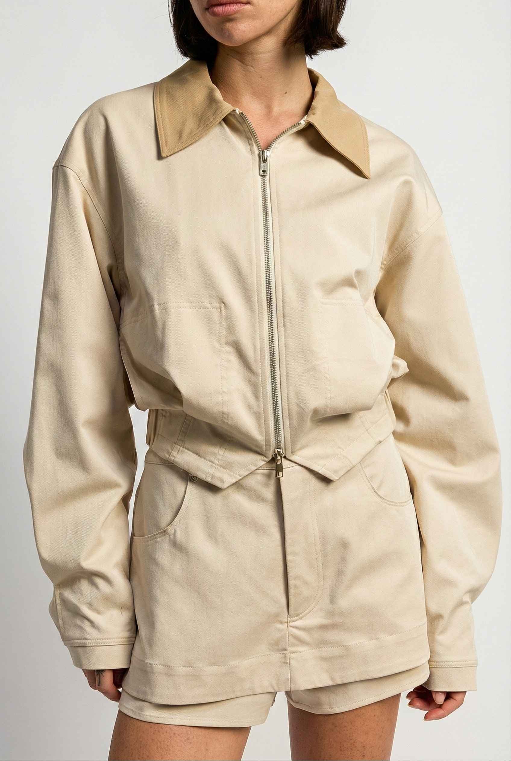 Model wearing Arlo Jacket | Beige Lyocell-Blend Jacket with Contrast Collar with shorts