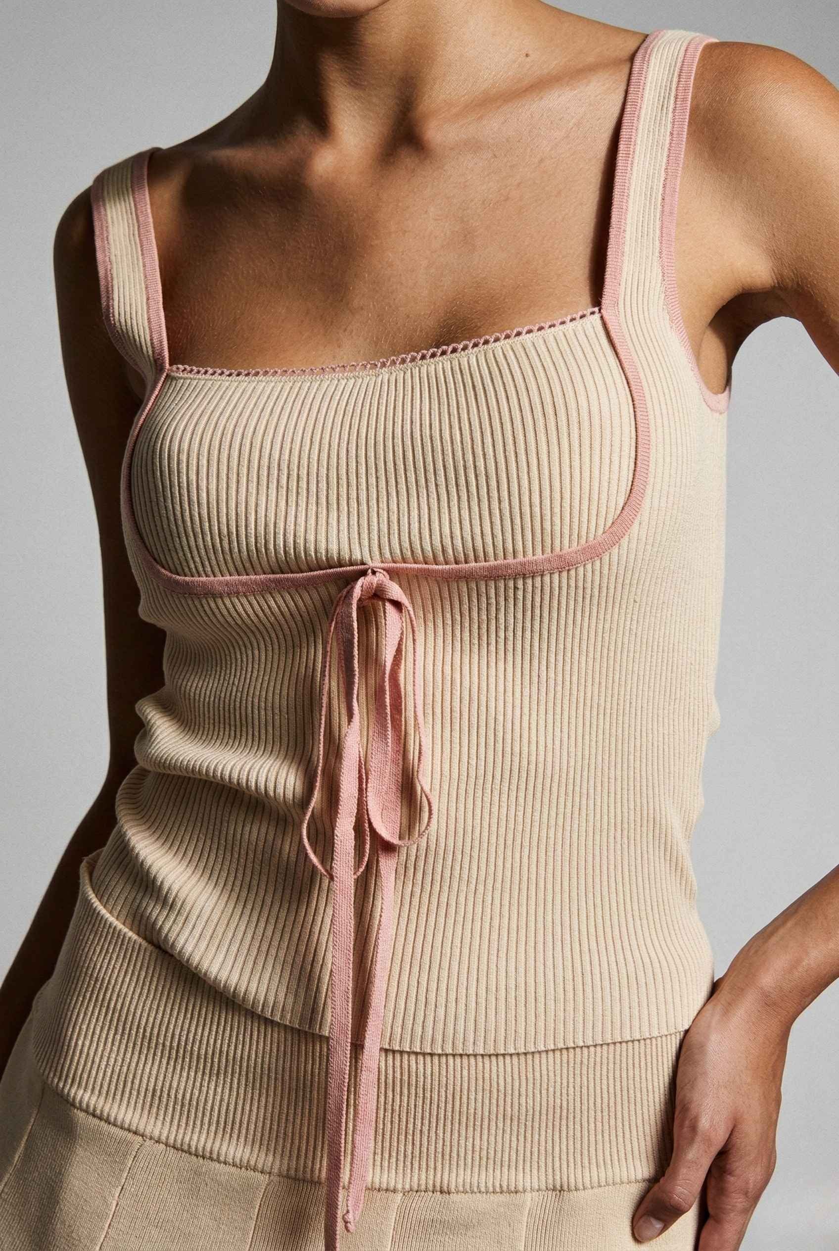 Chloe Top Beige Contrast Trim Ribbed Knit Tank with pink trim on a neutral background