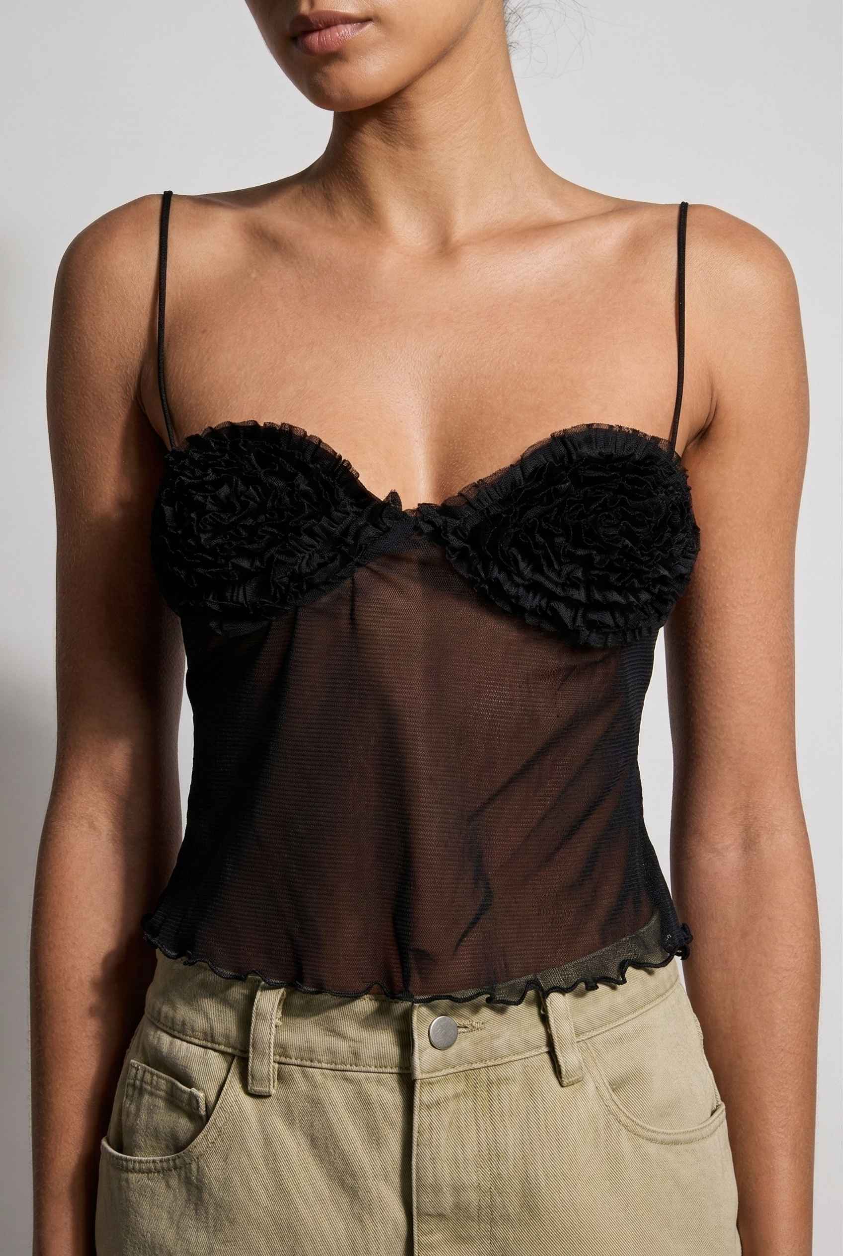 Elara Top Black Sheer Mesh Camisole with 3D Floral Cups worn by a model on a plain background