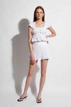 The Elodie Smocked Ruffle Mini Skirt