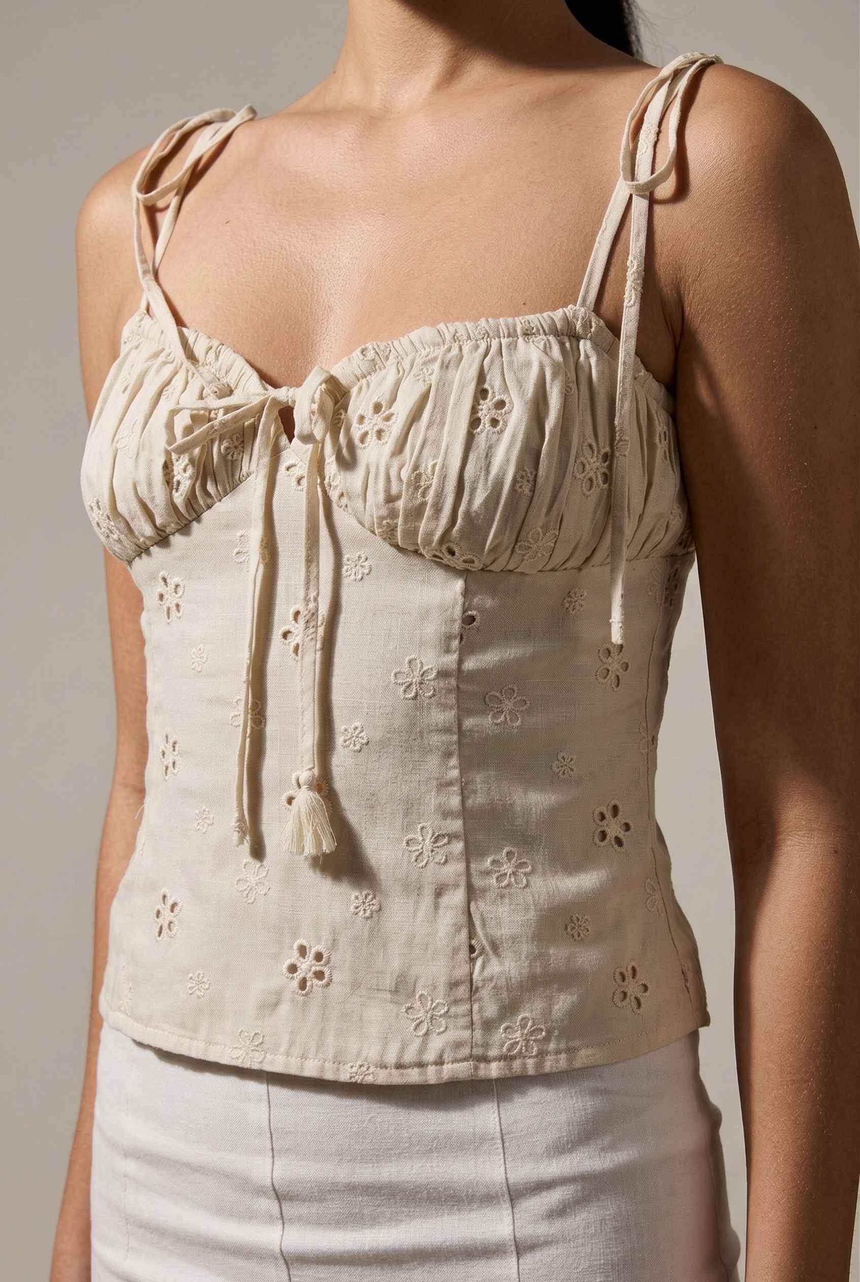 Elodie Top Ivory Floral Embroidered Tie-Strap Corset Top with floral embroidery on a neutral background