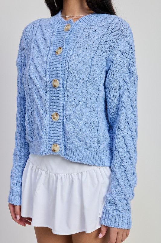 Chunky Cable Knit Cardigan in light blue by Emory Park with wooden buttons cropped fit and long sleeves