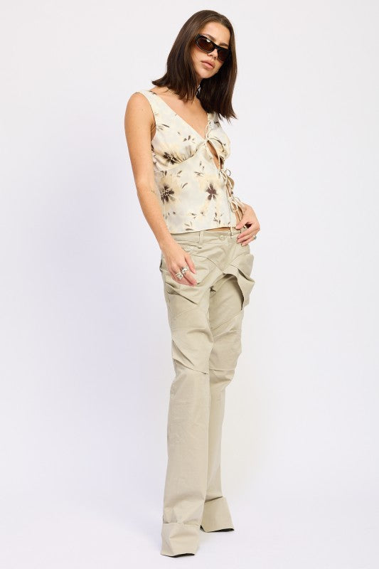Emory Park floral tie front cami top paired with beige cargo wide leg pants on model