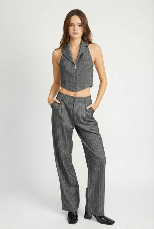 Model wearing Hayden Pants in Grey Pinstripe Wide-Leg Trousers with matching vest top and chunky heels