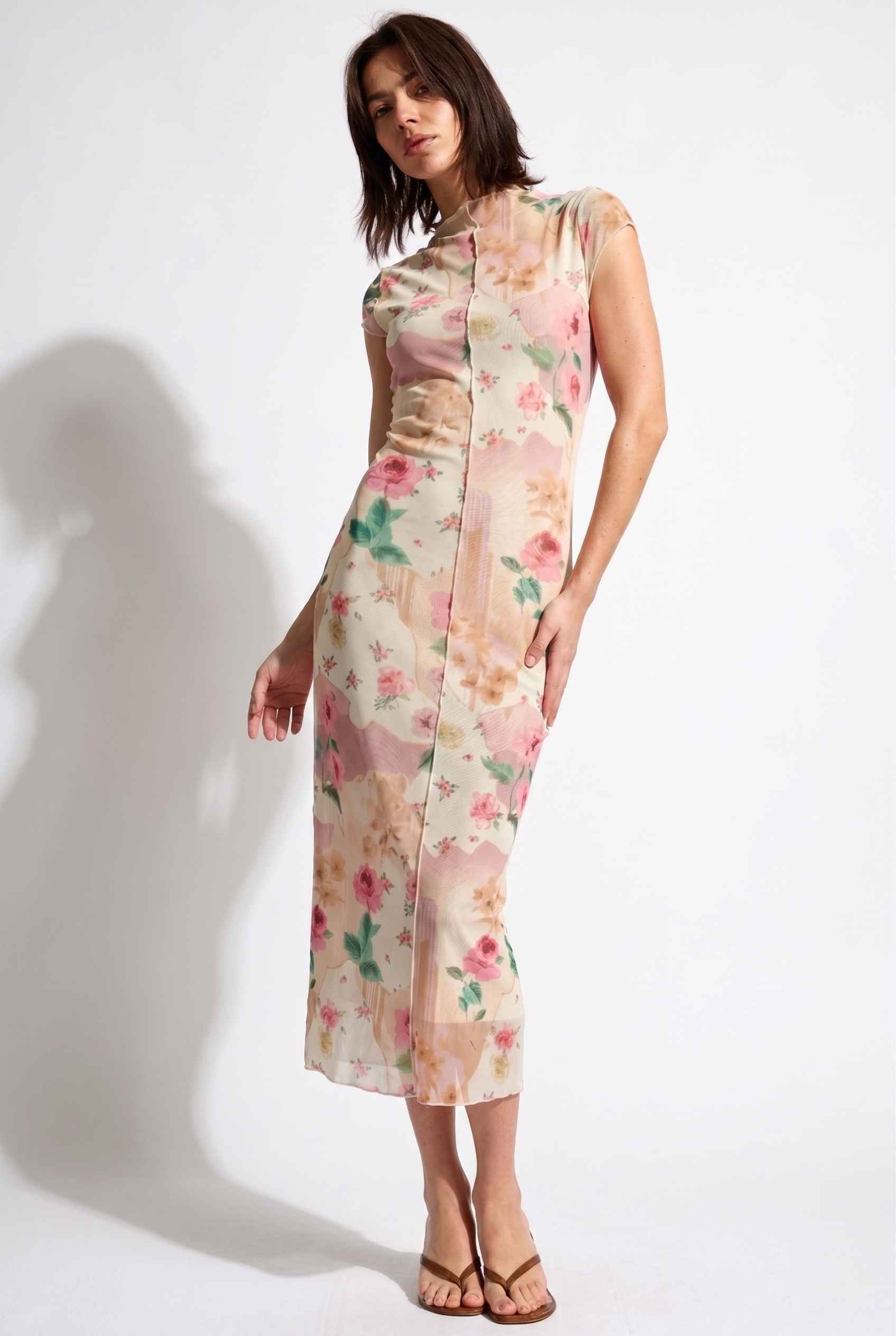 Model wearing Isabella Floral Mesh Midi Dress in Rose Floral Cap Sleeve Column Dress paired with heeled sandals