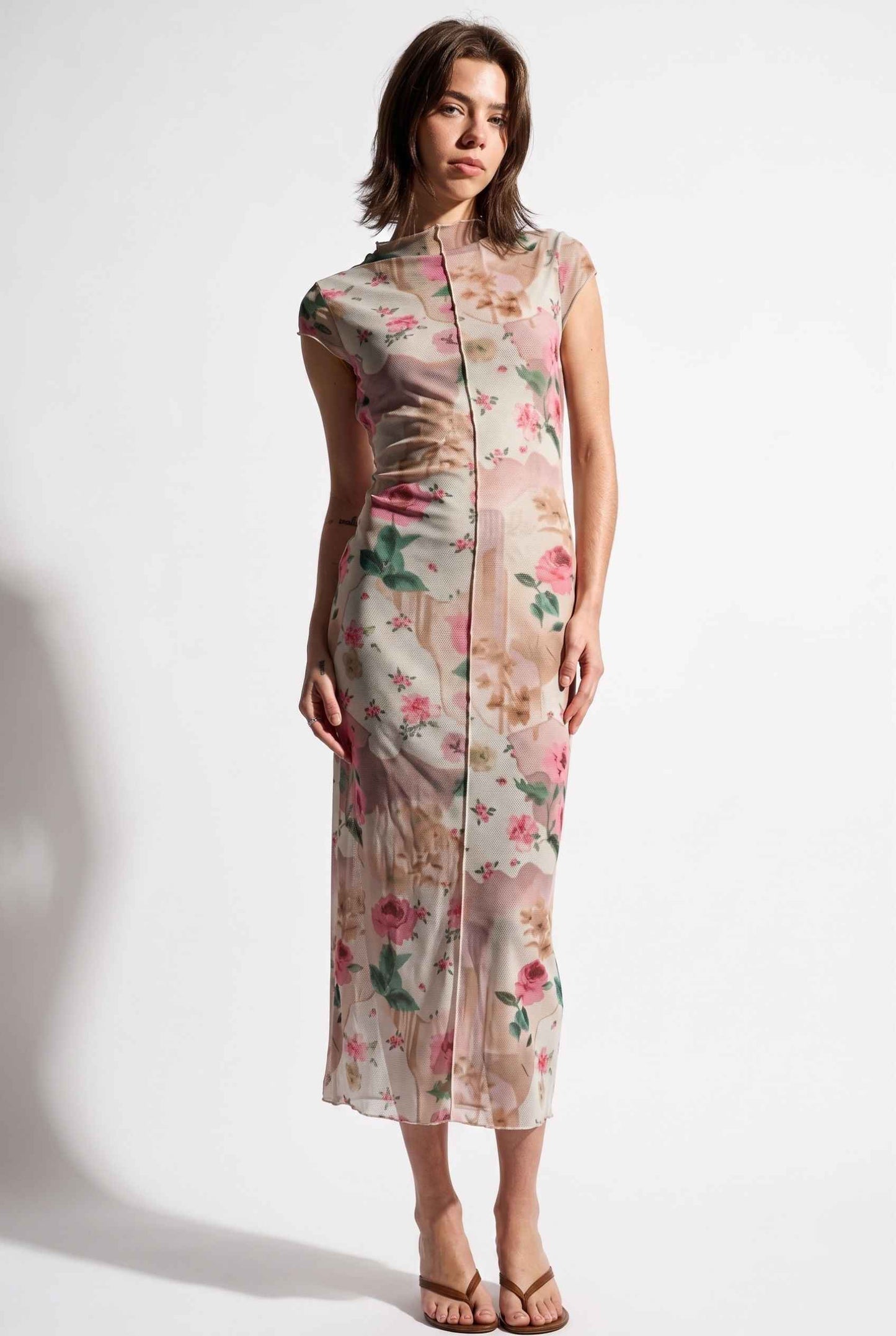 Model wearing Isabella Floral Mesh Midi Dress in Rose Floral Cap Sleeve Column Dress paired with heeled sandals