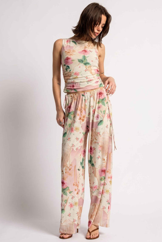 Model wearing Isabella Ruched Floral Tank in Rose Floral Sleeveless Mesh Top paired with matching bottoms and heeled sandals