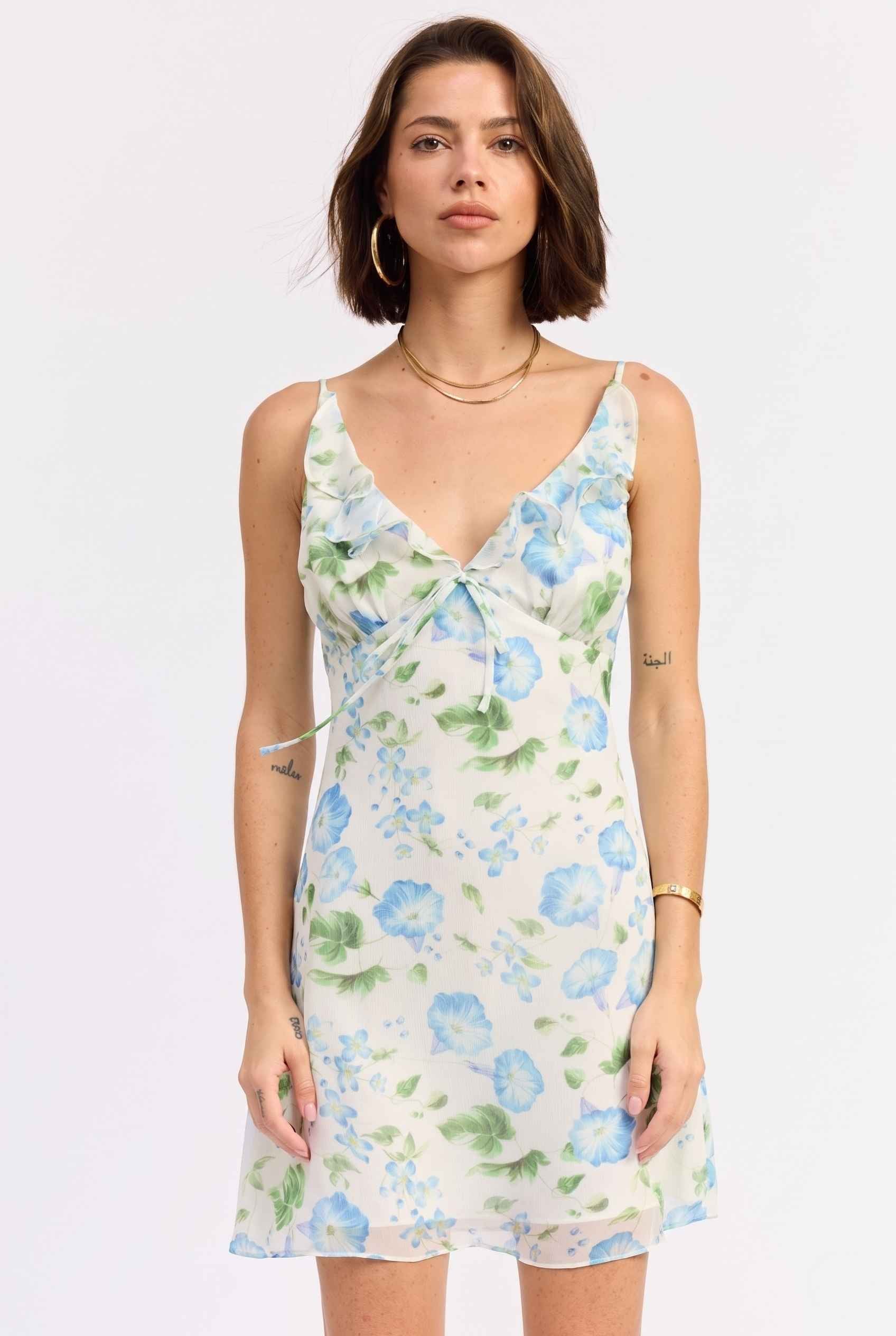 Model wearing Julia V-Neck Ruffle Floral Mini Dress Chiffon Slip Dress in Blue