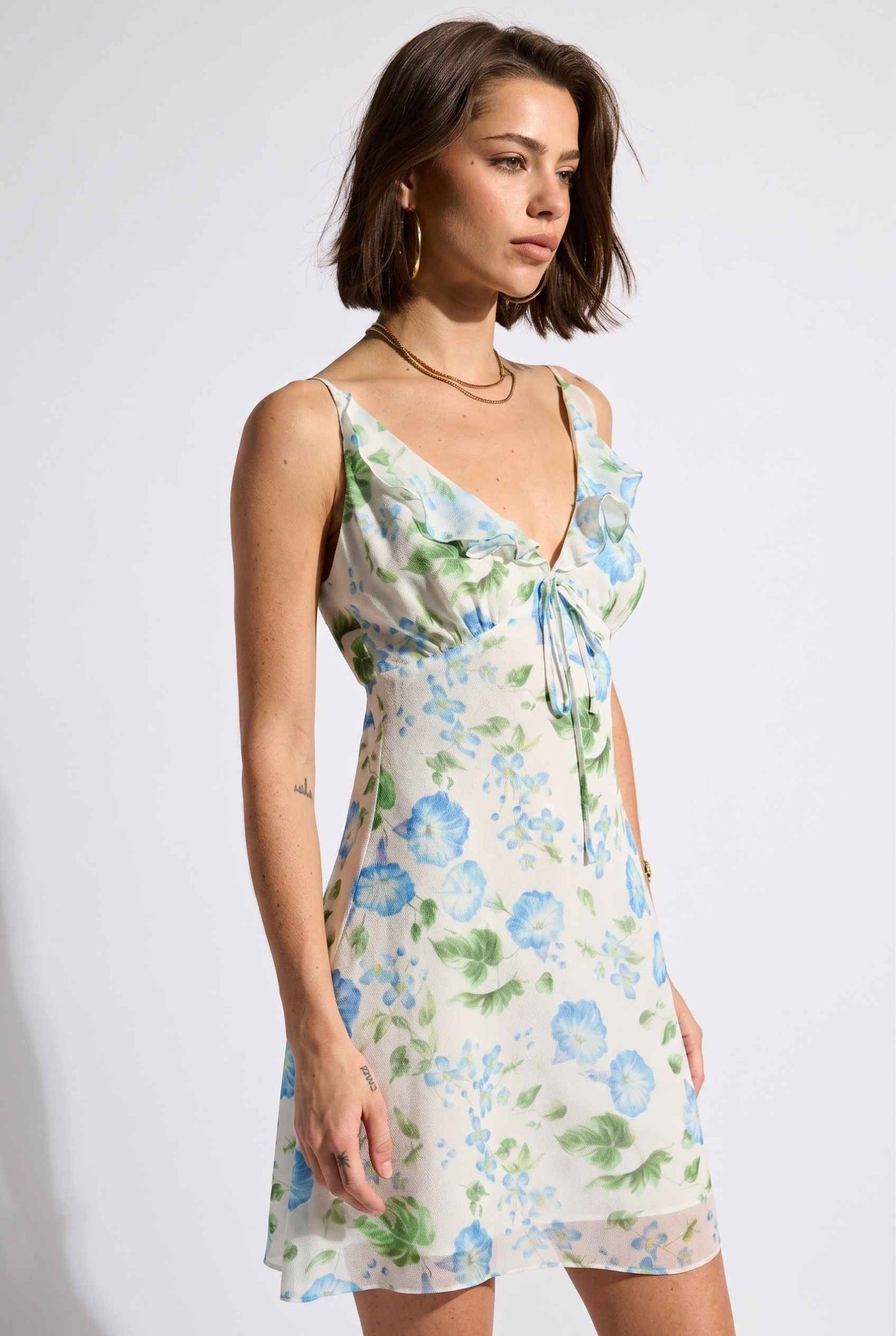 Model wearing Julia V-Neck Ruffle Floral Mini Dress Chiffon Slip Dress in Blue 