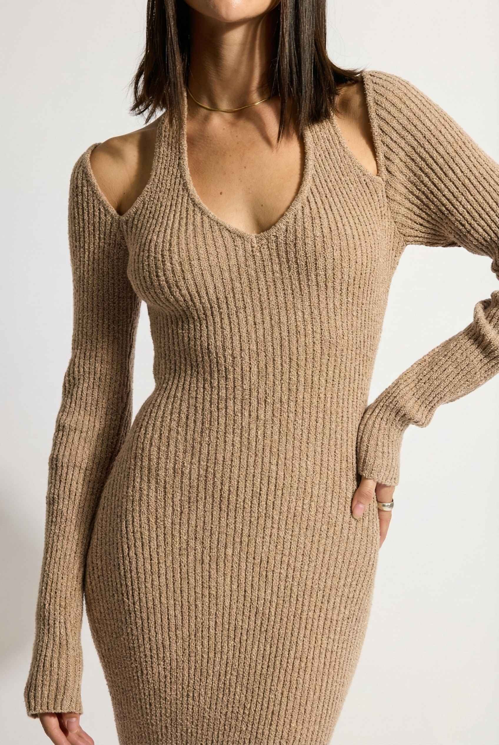 Keaton Midi Mocha Cutout Shoulder Ribbed Knit Dress worn by a woman on a white background