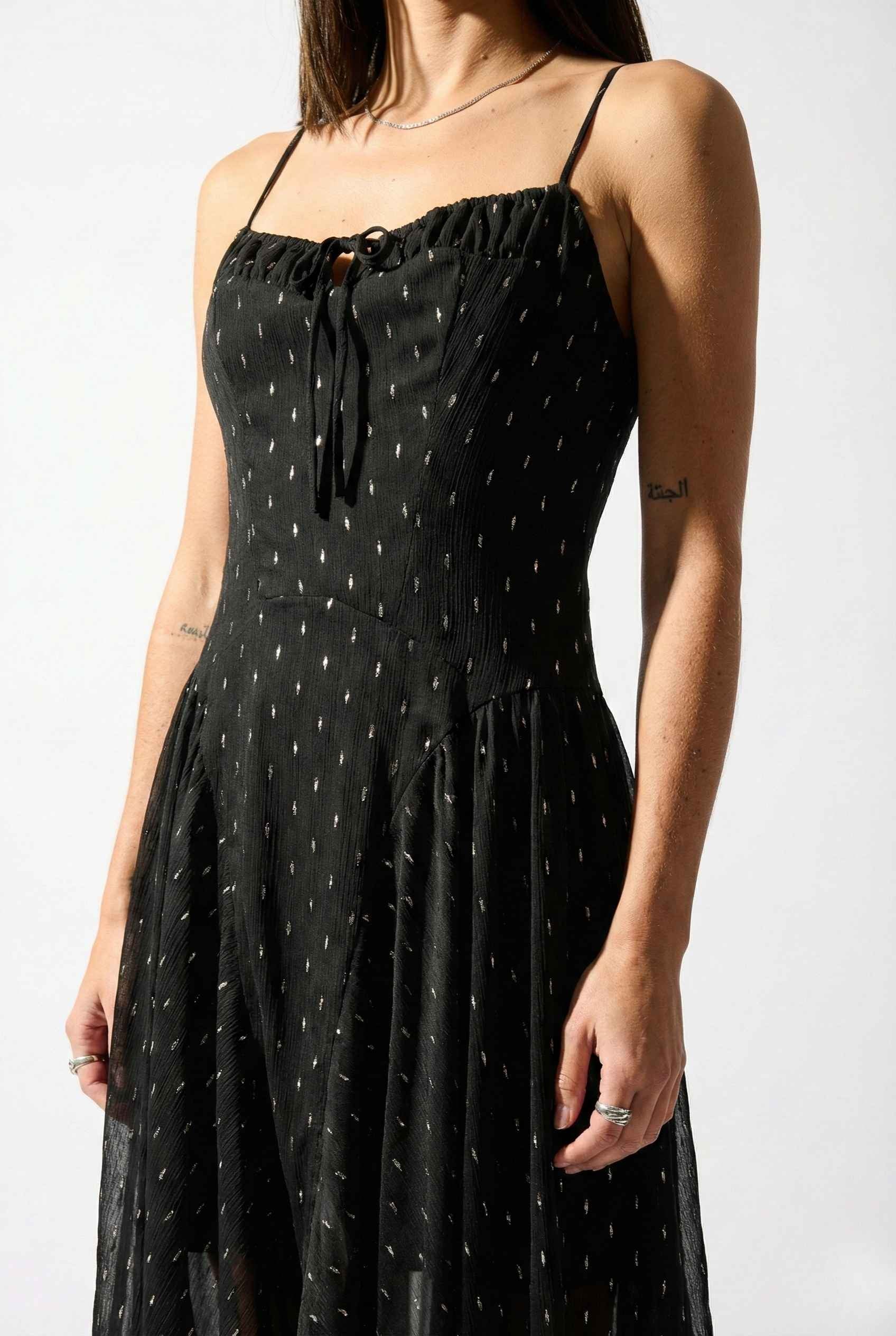Lyra Maxi Black Metallic Fleck Chiffon Dress worn by a person on a white background