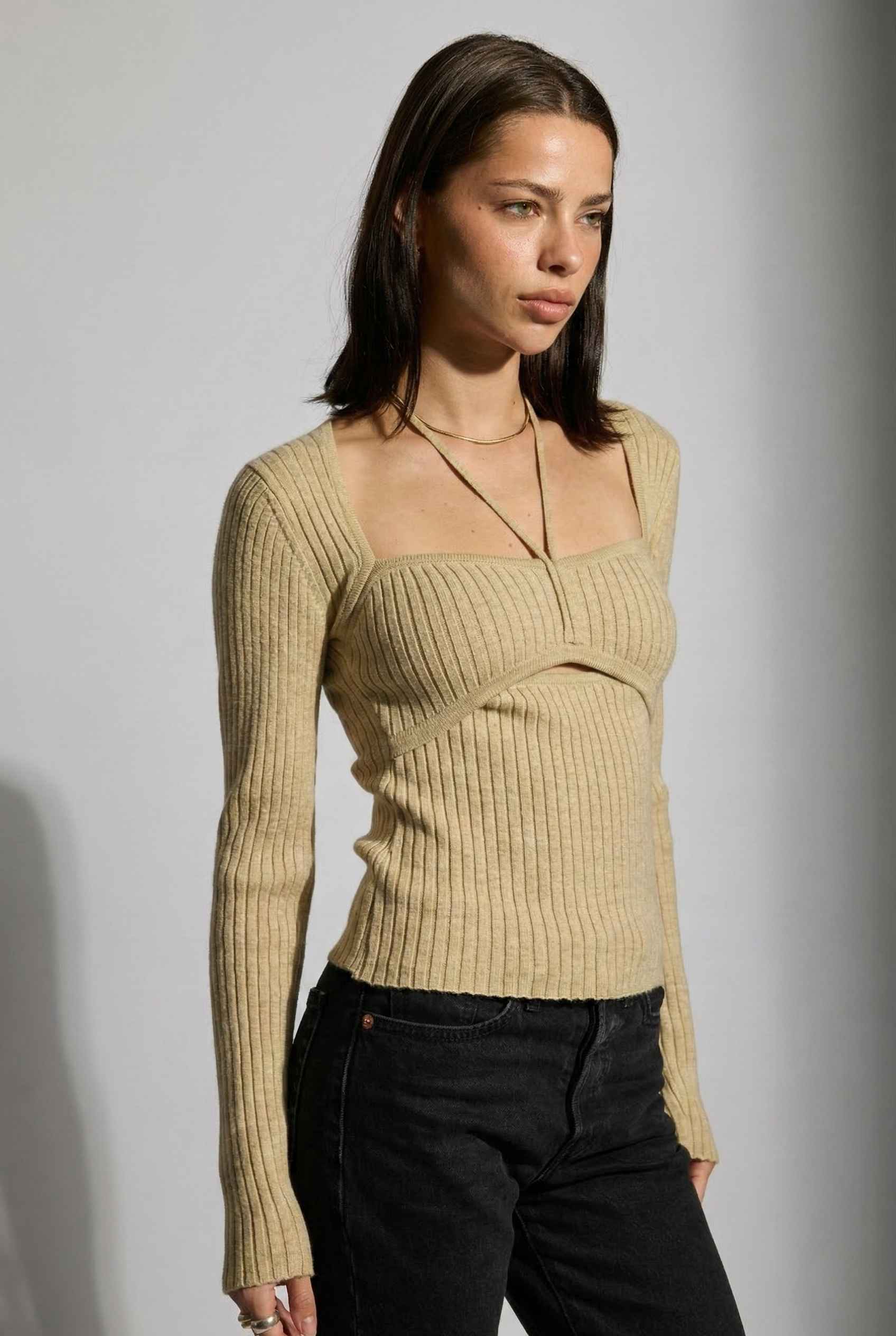 Lyra Top in Cream Beige Square Neck Ribbed Knit Top with Halter Strap Detail paired with trousers