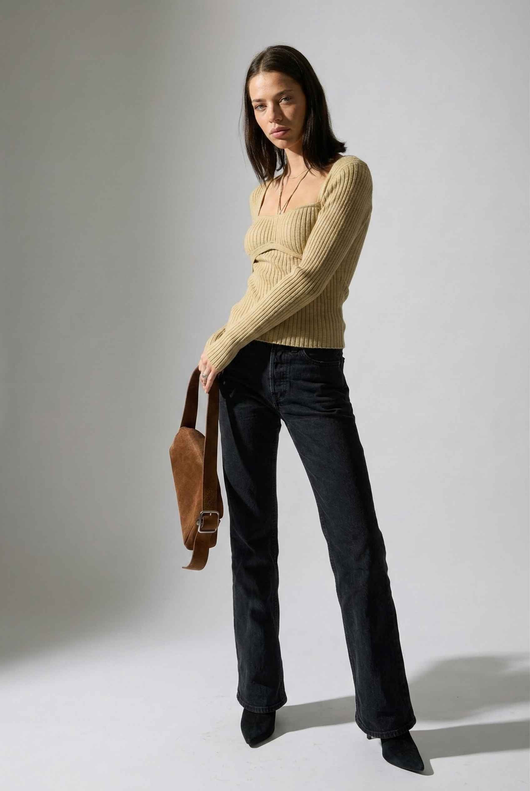 Lyra Top in Cream Beige Square Neck Ribbed Knit Top with Halter Strap Detail paired with trousers and heels
