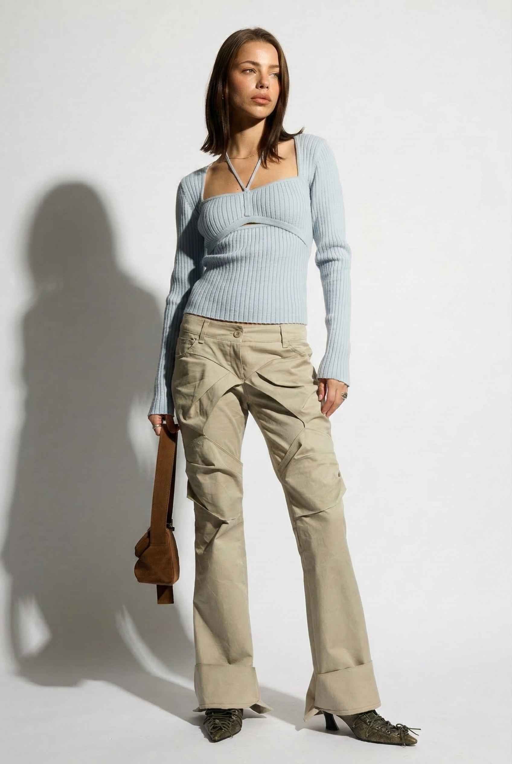 Lyra Top in Blue Square Neck Ribbed Knit Top with Halter Strap Detail paired with cargo pants and pointed toe heels