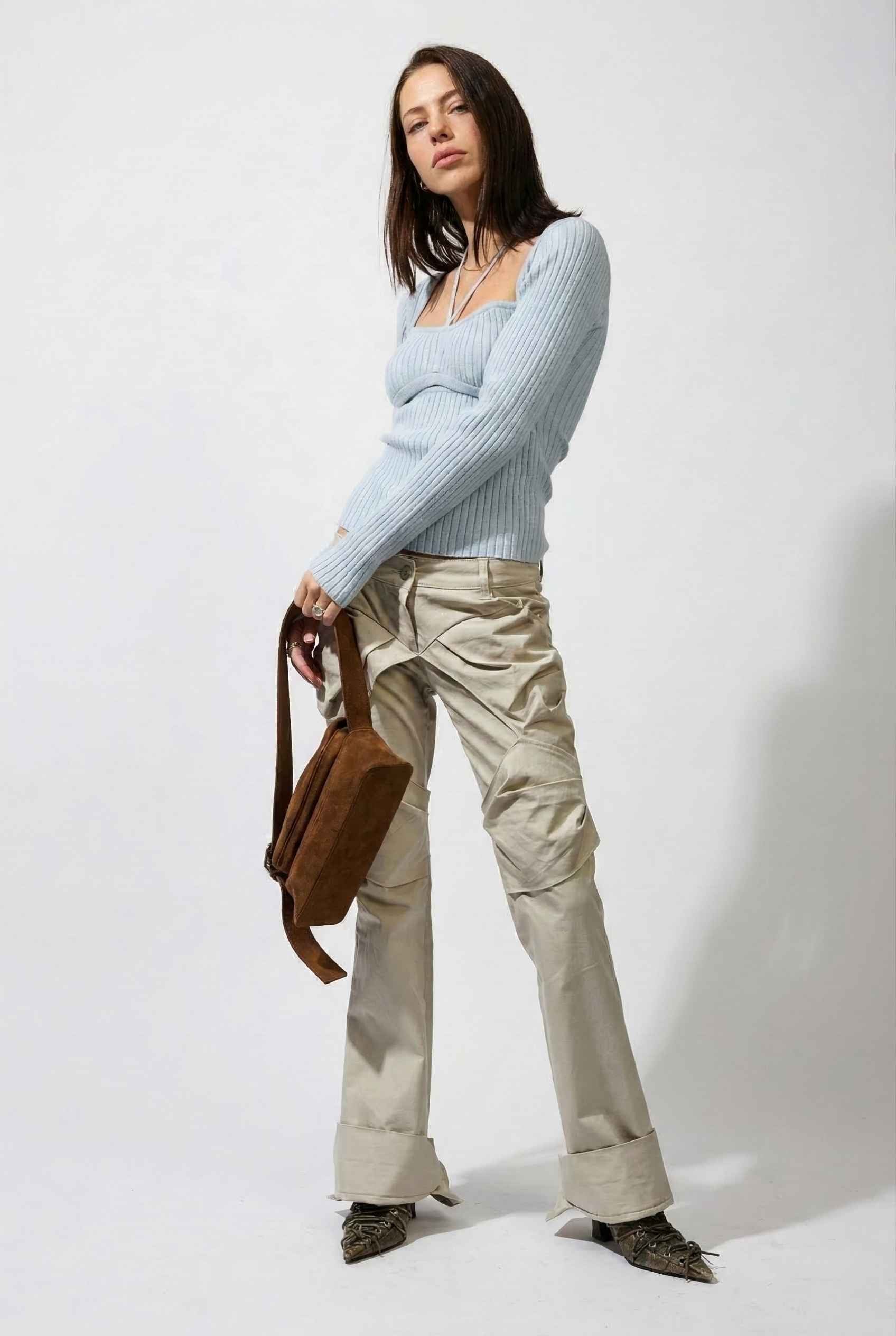 Lyra Top in Blue Square Neck Ribbed Knit Top with Halter Strap Detail paired with cargo pants and pointed toe heels