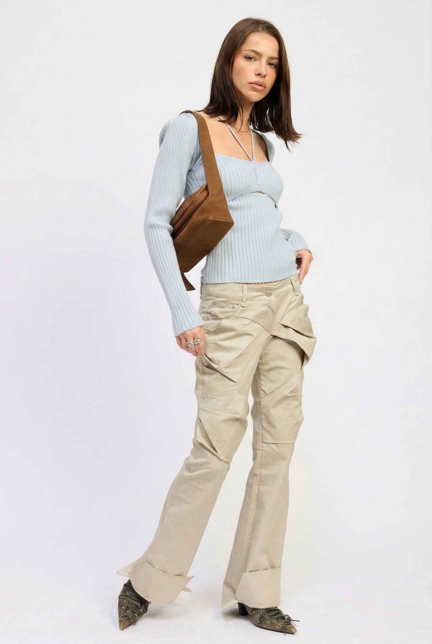 Lyra Top in Blue Square Neck Ribbed Knit Top with Halter Strap Detail paired with cargo pants and pointed toe heels
