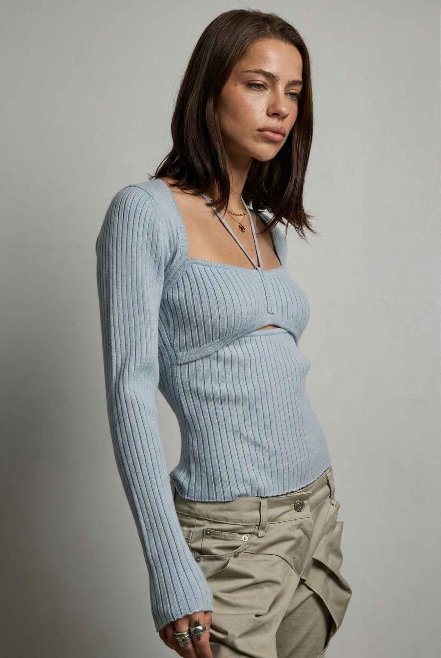 Lyra Top in Blue Square Neck Ribbed Knit Top with Halter Strap Detail paired with cargo pants