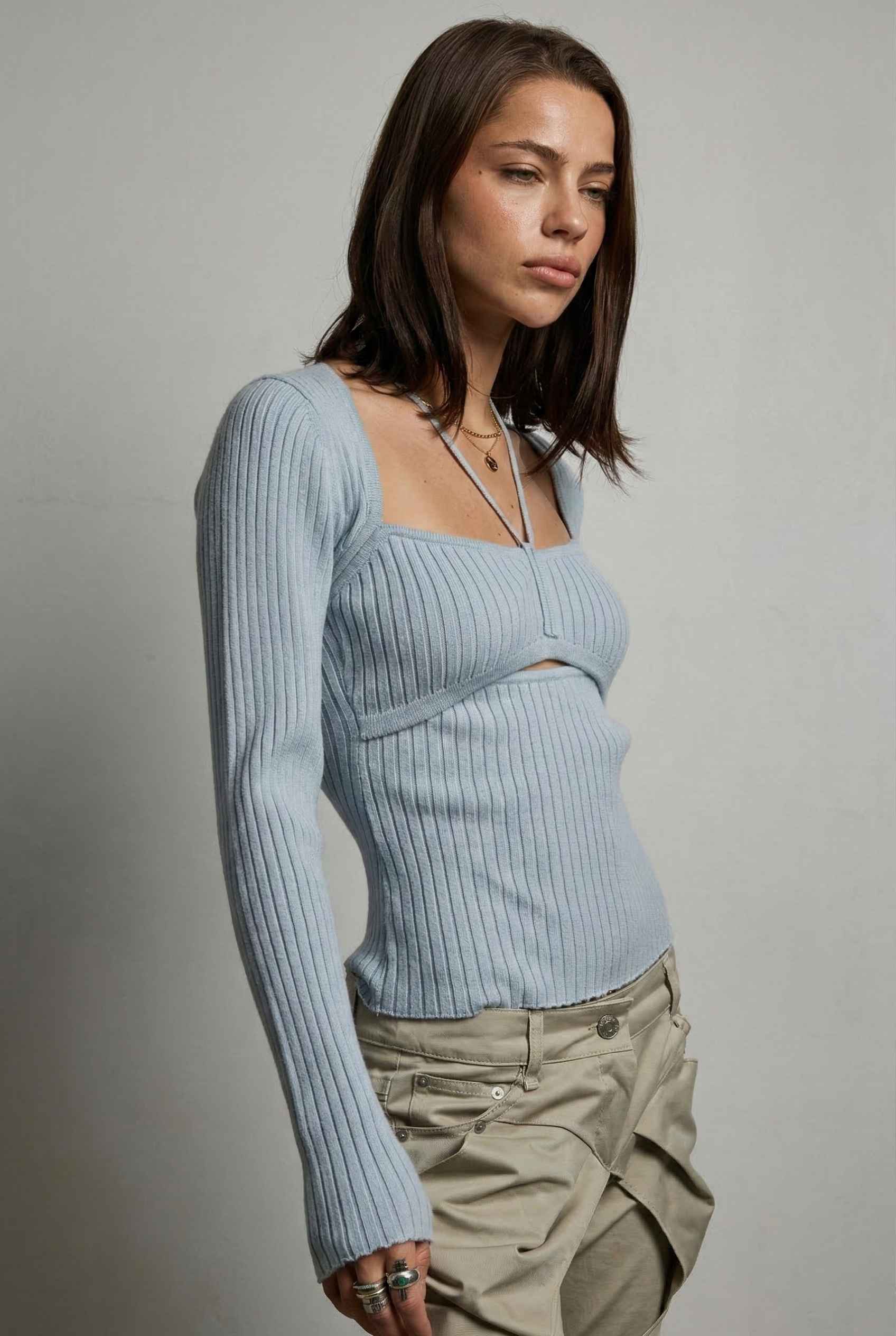Lyra Top in Blue Square Neck Ribbed Knit Top with Halter Strap Detail paired with cargo pants