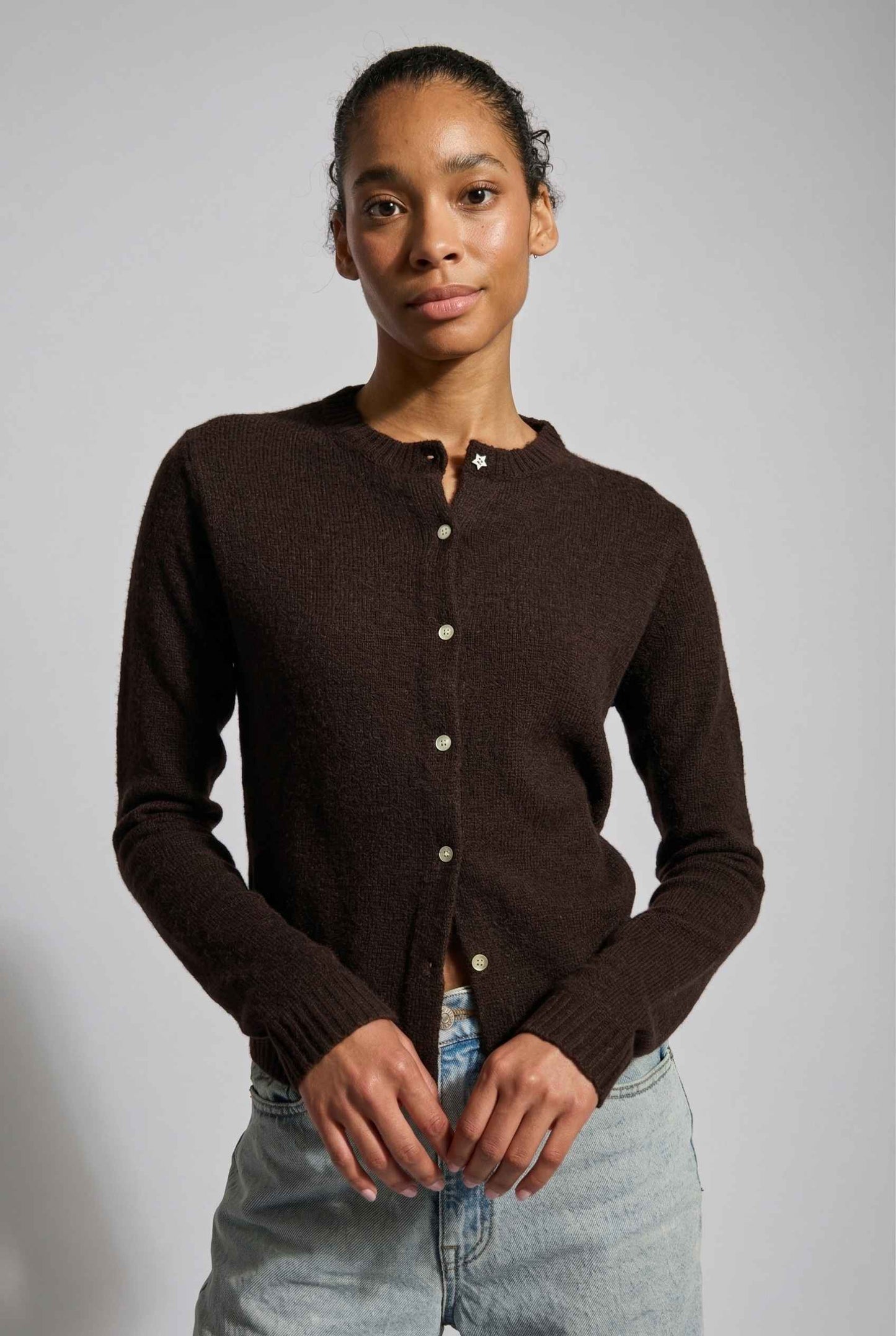 Model wearing Penelope Top in Chocolate Soft Wool-Blend Crew Neck Button-Up Cardigan with jeans