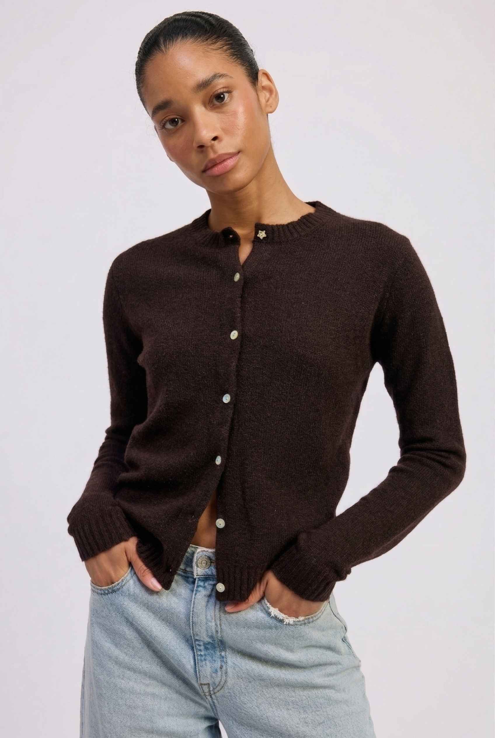 Model wearing Penelope Top in Chocolate Soft Wool-Blend Crew Neck Button-Up Cardigan with jeans