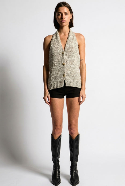 Model wearing Rowan Top in Grey Marled Mix Knit Button-Front Halter Vest with mini shorts and tall boots