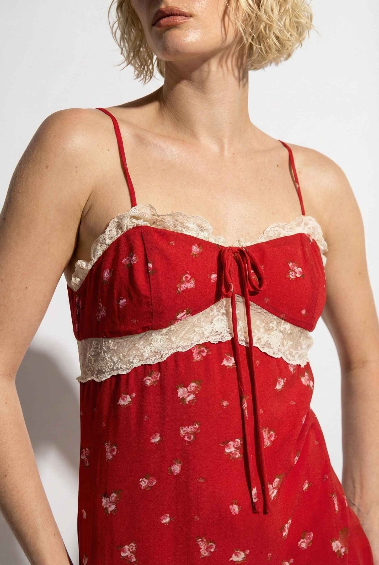 Scarlett Maxi Red Floral Lace Trim Dress with lace details worn by a model against a white background
