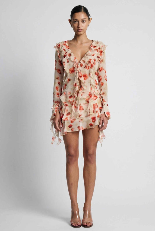 Model wearing Sienna Skirt in Red Floral Layered Ruffle Mini Skirt paired with matching ruffle blouse and heels