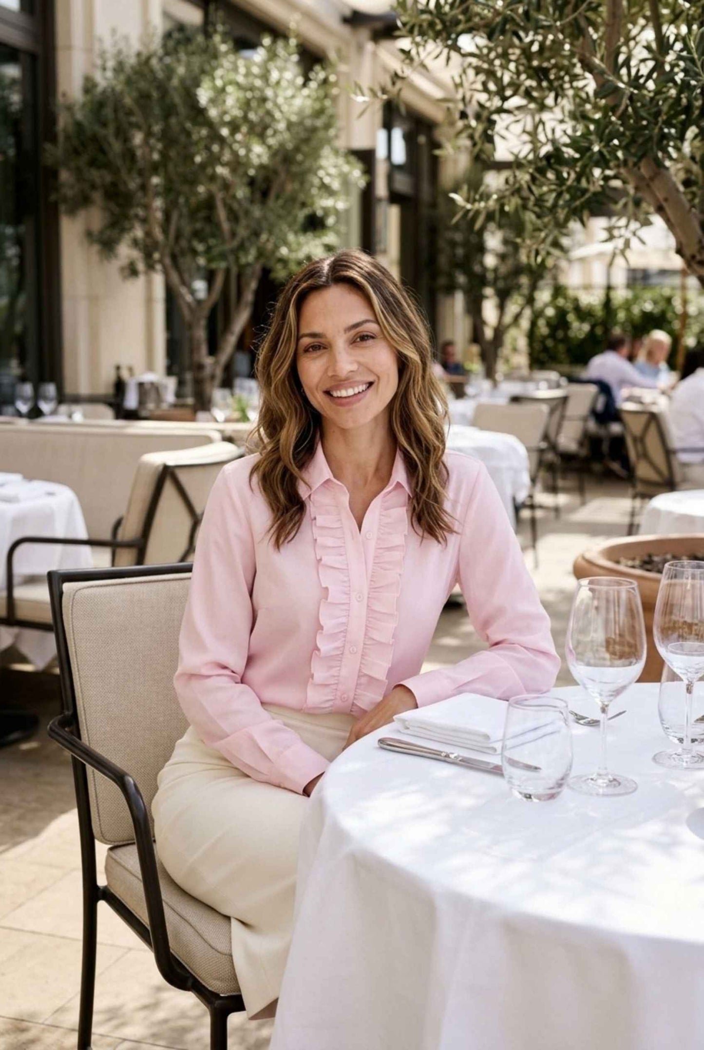 Virtual model wearing The Aria Ruffle Blouse Ruffle Georgette Button-Down Blouse in Pink