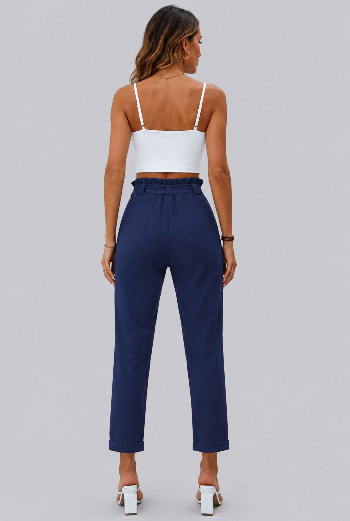 Virtual Model wearing The Arwen Tapered Pant Paperbag Waist Navy Tapered Trouser