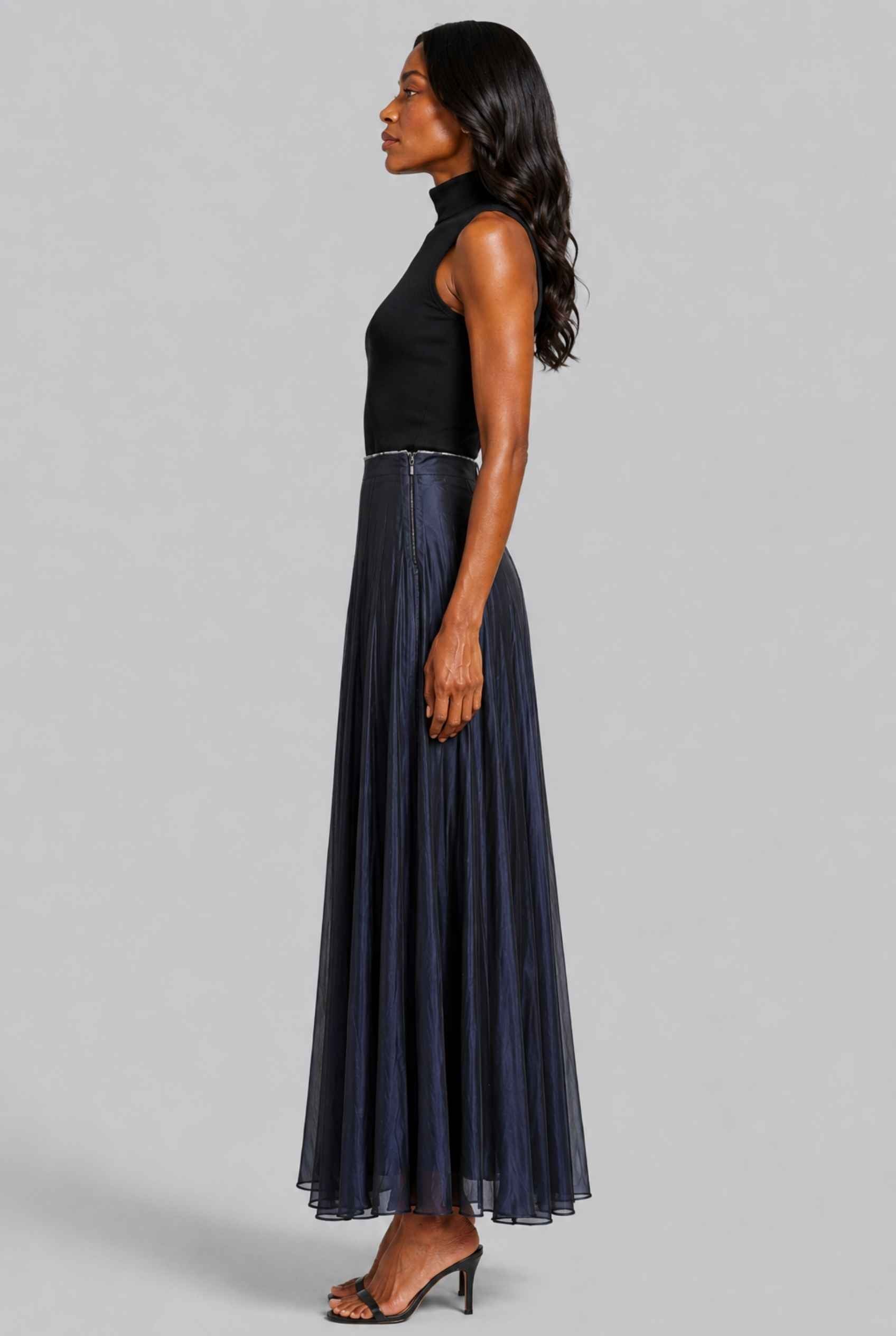 Virtual Model wearing The Astrid Pleated Skirt Lustrous Satin Navy Midi Skirt