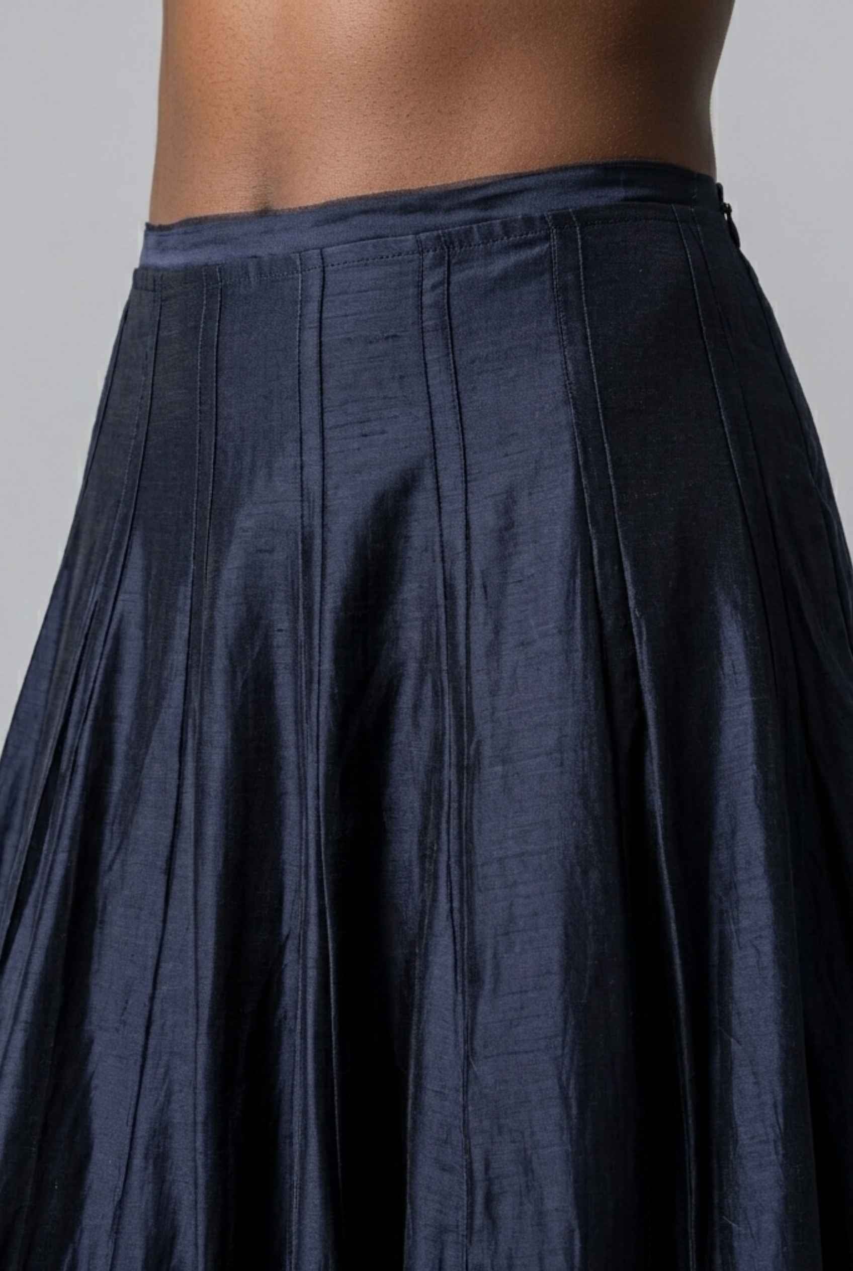 Virtual Model wearing The Astrid Pleated Skirt Lustrous Satin Navy Midi Skirt