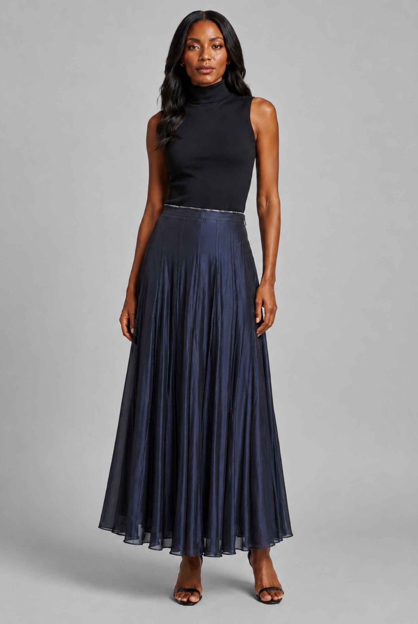 Virtual Model wearing The Astrid Pleated Skirt Lustrous Satin Navy Midi Skirt