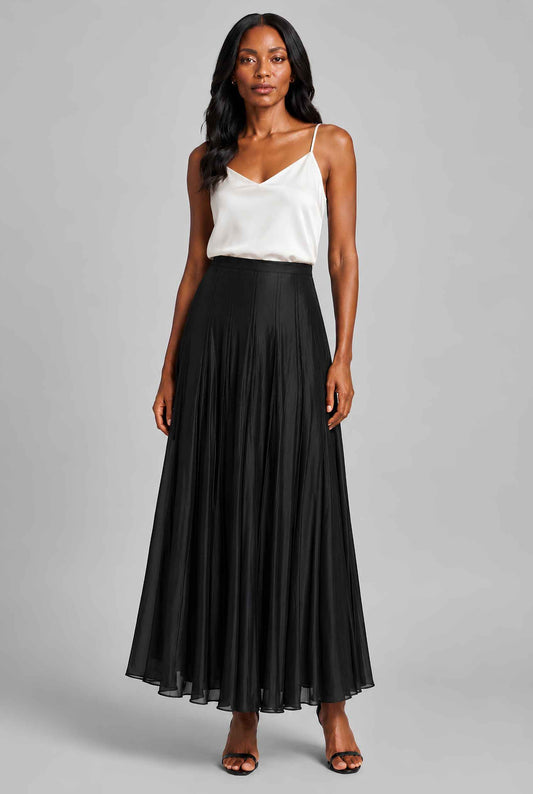 Virtual model wearing The Astrid Pleated Skirt Lustrous Satin Pleated Skirt in Black