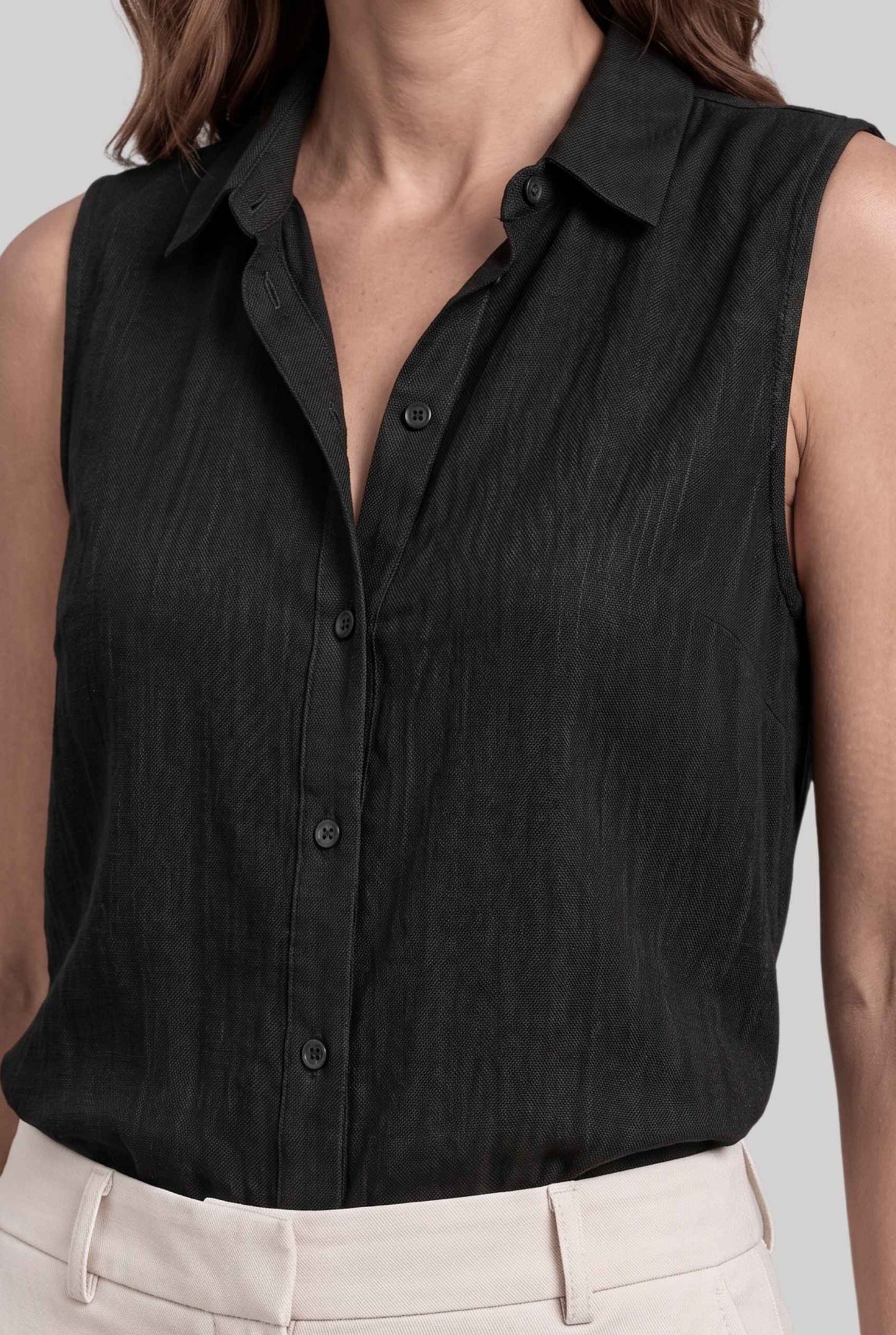 Virtual model wearing The Blair Buttoned Top sleeveless Collared Buttoned Blouse in Black