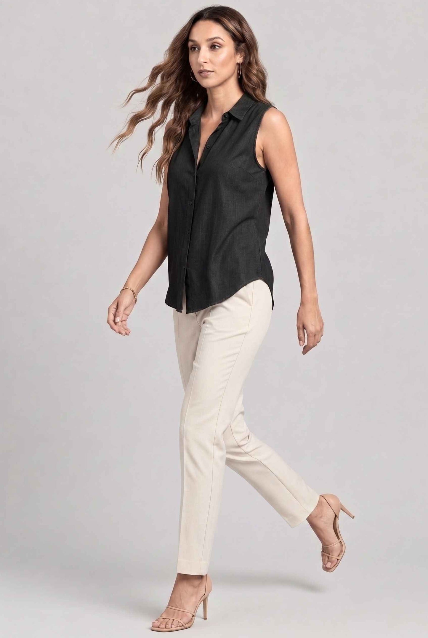 Virtual model wearing The Blair Buttoned Top sleeveless Collared Buttoned Blouse in Black