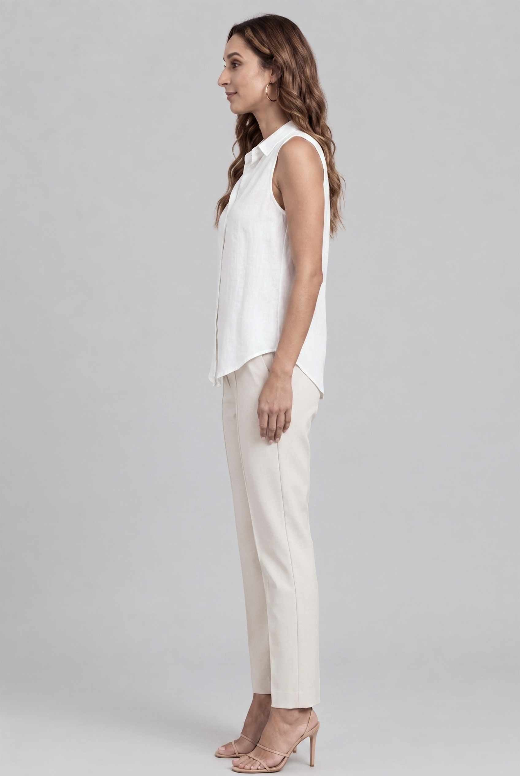 Virtual model wearing The Blair Buttoned Top sleeveless Collared Buttoned Blouse in white