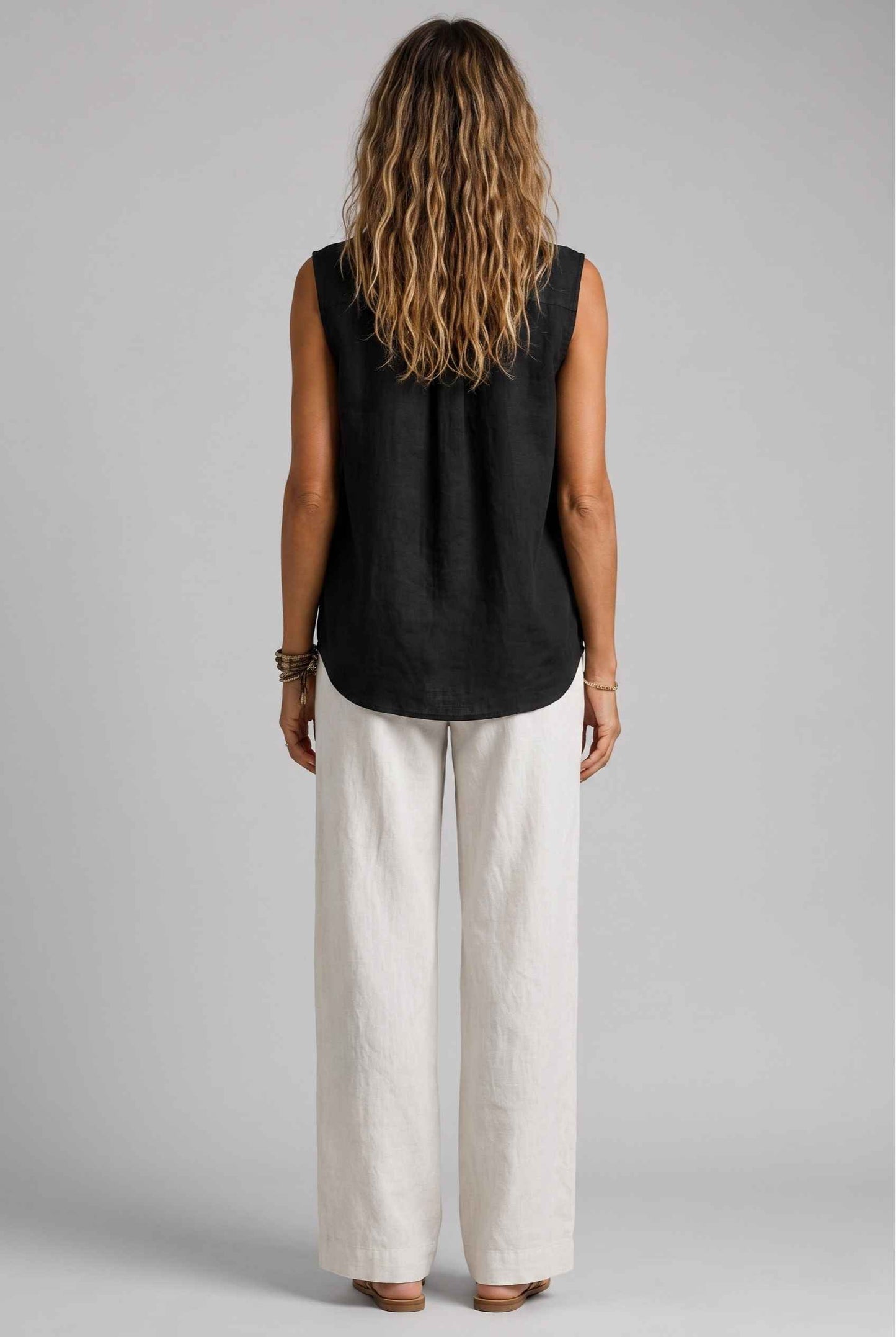 Virtual Model wearing The Blair Buttoned Top Sleeveless Black Collared Top