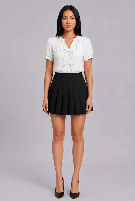 Virtual Model Wearing The Blythe Pleated Mini Skirt Black High-Waisted Pleated Tennis Mini Skirt