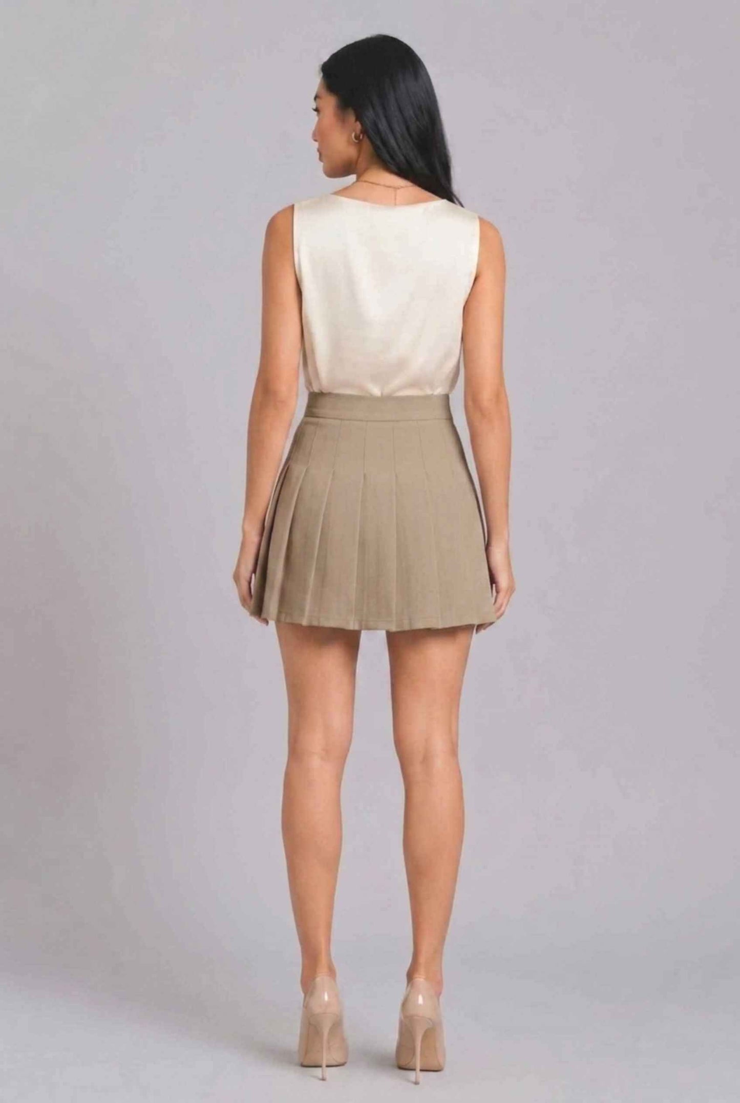 Virtual Model Wearing The Blythe Pleated Mini Skirt khaki High-Waisted Pleated Tennis Mini Skirt